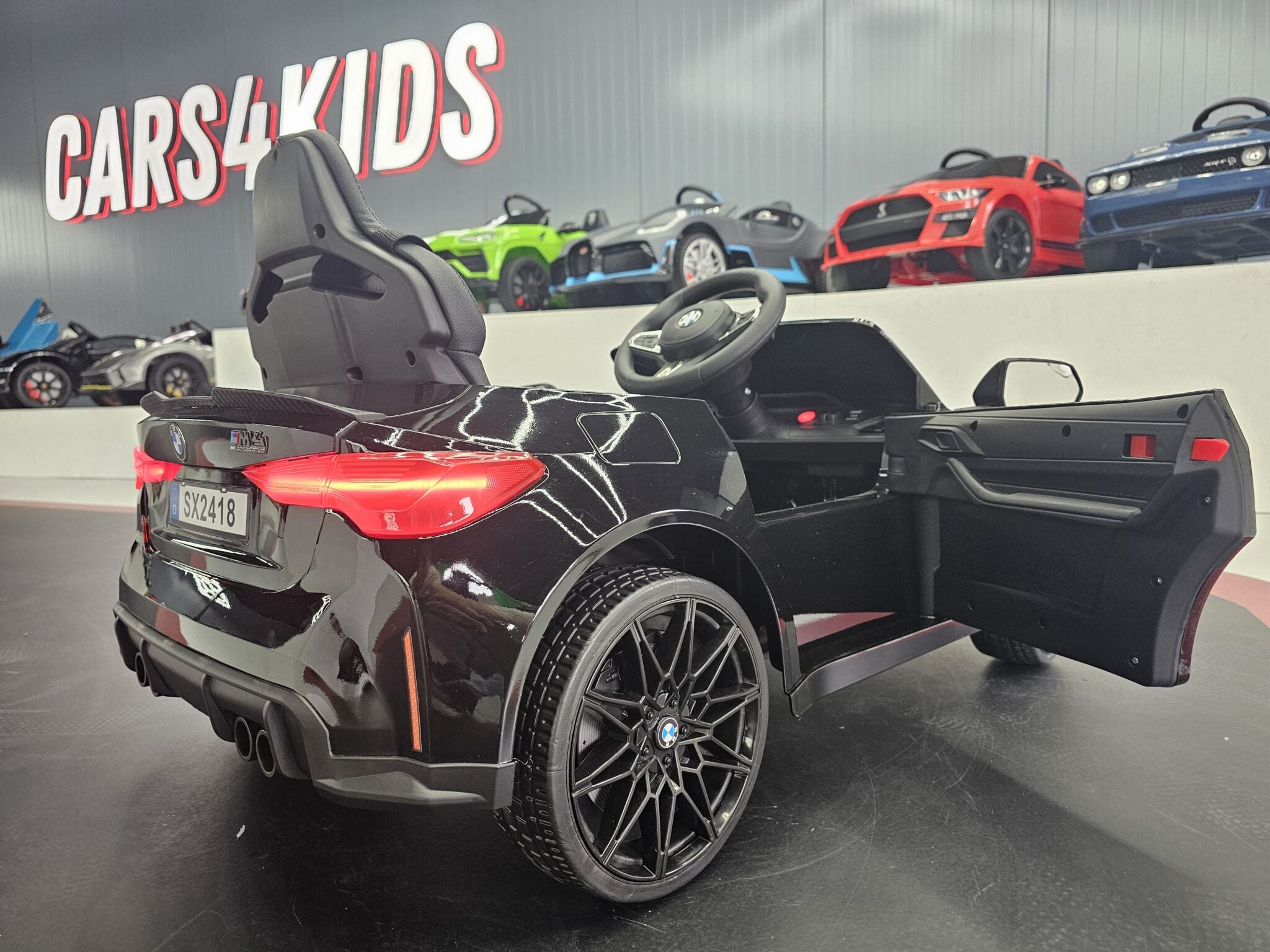 Voiture électrique enfant BMW M4 12 V noir métallisé – Urban Rider – vue 4