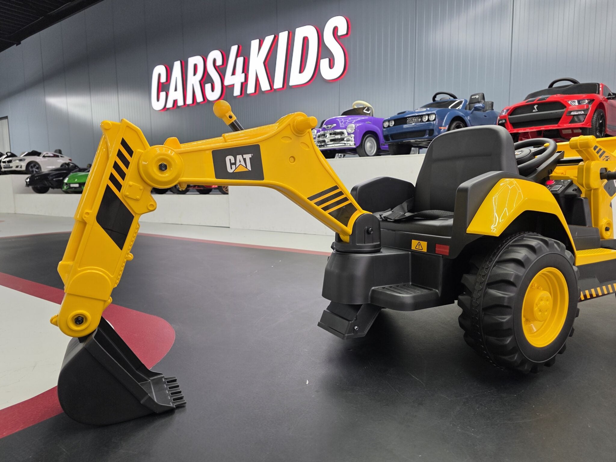 Engin de chantier pour enfant Loading excavator combination Caterpillar 12 V – Urban Rider – vue 6