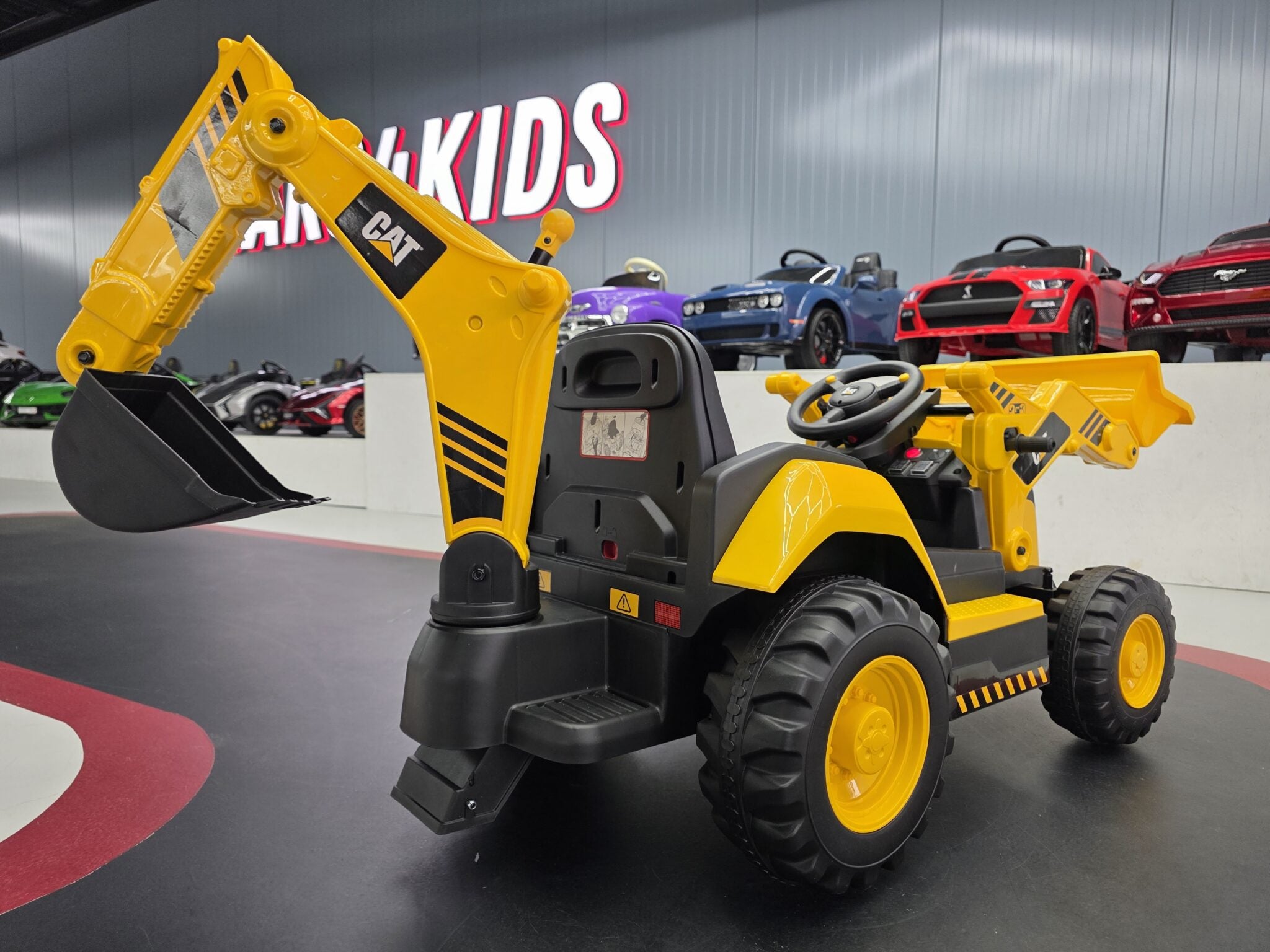Engin de chantier pour enfant Loading excavator combination Caterpillar 12 V – Urban Rider – vue 4
