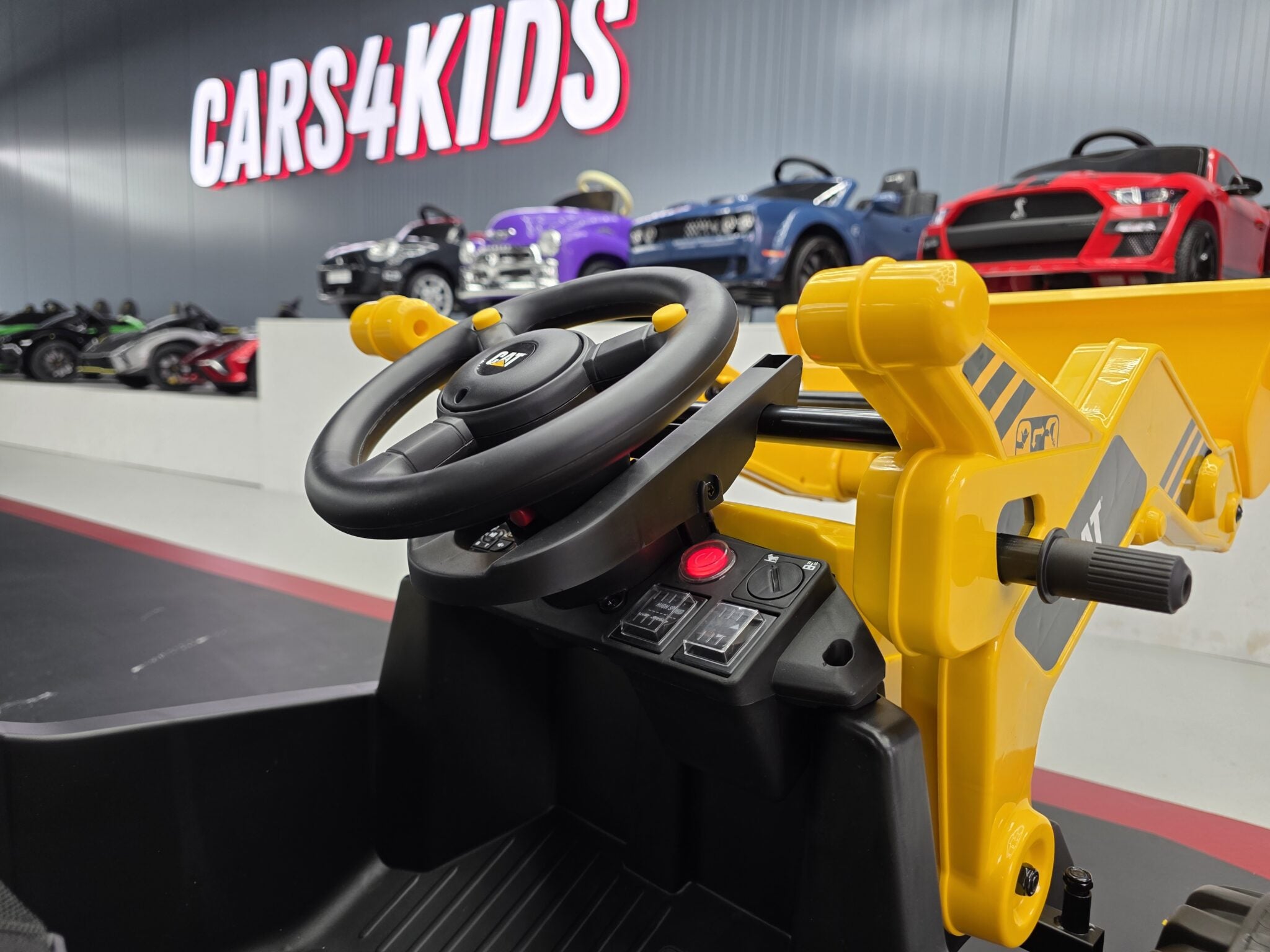 Engin de chantier pour enfant Loading excavator combination Caterpillar 12 V – Urban Rider – vue 7